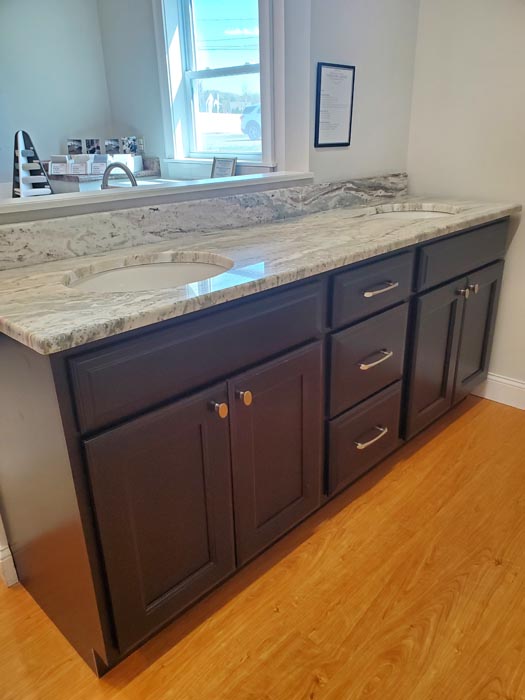 Plaistow Cabinet showroom displays of cabinetry and finishes at 56 Newton Road